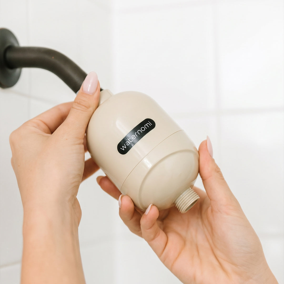 Fitting the Waternomi filter between the shower arm and shower head